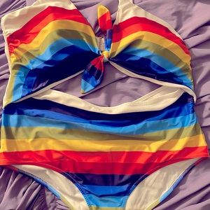 Rainbow cut-out one piece bathing suit.